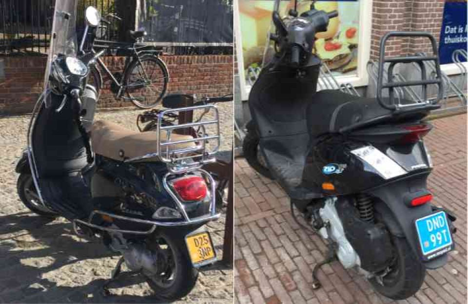 scooter met blauw en geel kenteken
